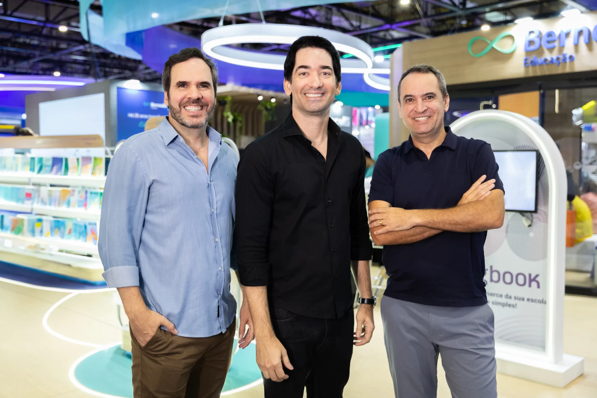 Sócios fundadores do Bernoulli Educação no palco